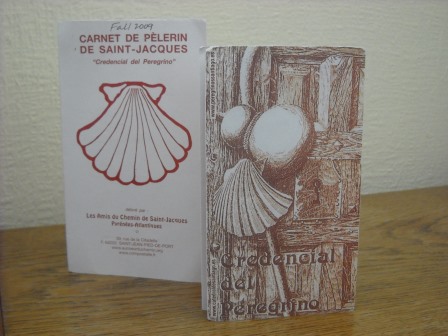 Photo of two pilgrim passports, or Credenciales, from the Camino de Santiago in France and Spain