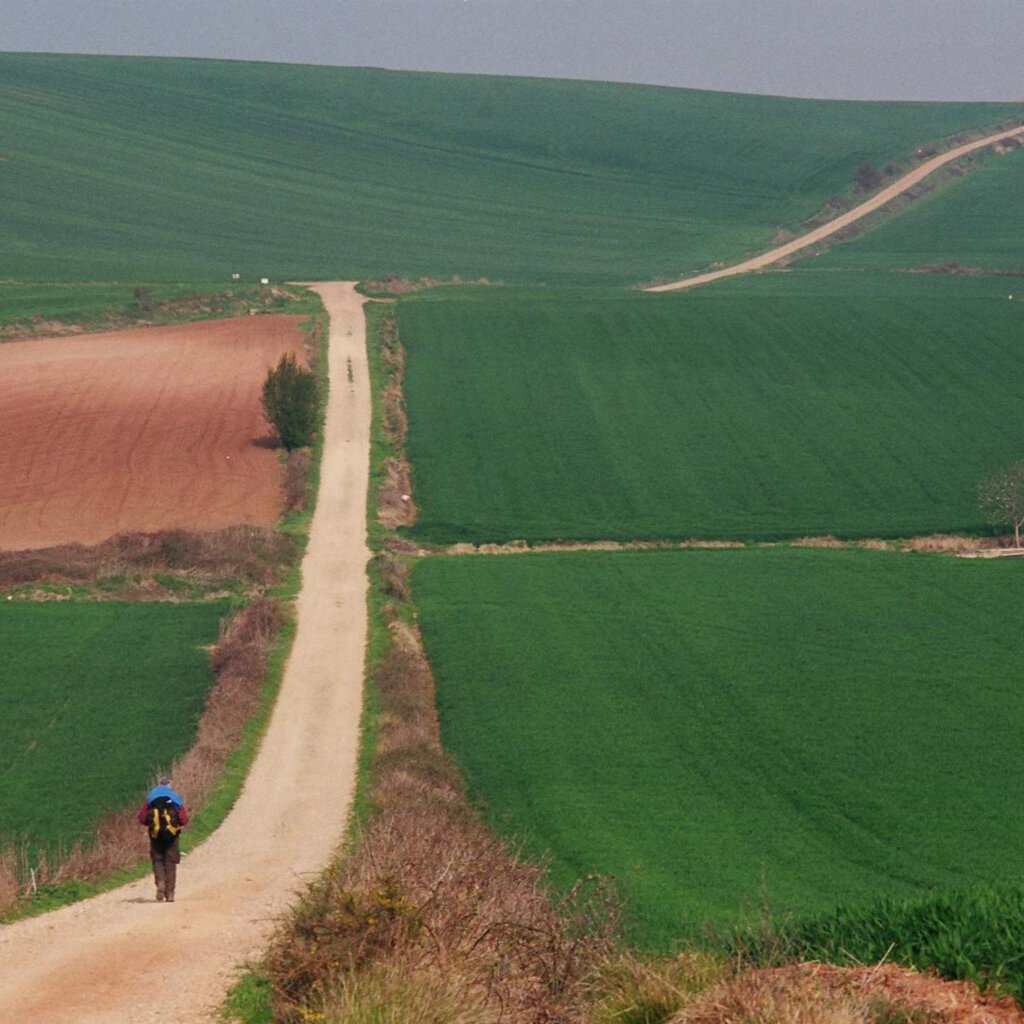 photo of pilgrim on Camino de Santiago in Spain in spring